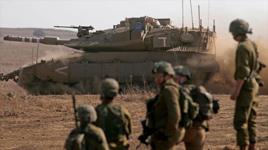 Soldados israelíes cerca del asentamiento de Kidmat Tsvi en los altos del Golán, 27 de octubre de 2021. (Foto: AFP)