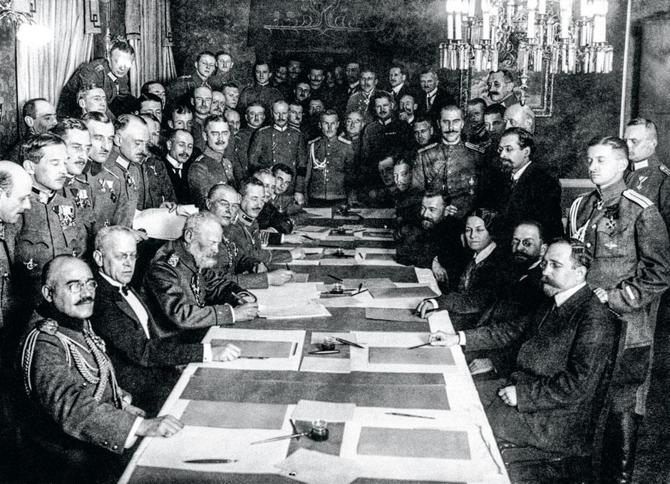The diplomats and officers of Central Powers and Russia signing the Treaty of Brest-Litovsk ratifying the exit of Russia from World War I. Brest-Litovsk, 3rd March 1918